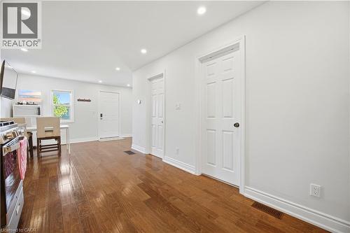 Hardwood-finish flooring extending through the space - 71 Beland Avenue N, Hamilton, ON 