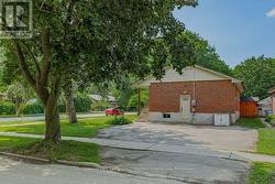 Triple-wide driveway- parking for 6 cars -