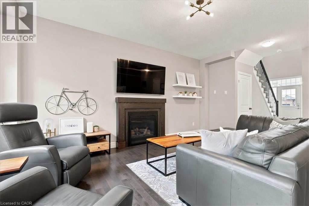 921 Eden Oak Court, Kitchener, ON - Indoor Photo Showing Living Room With Fireplace