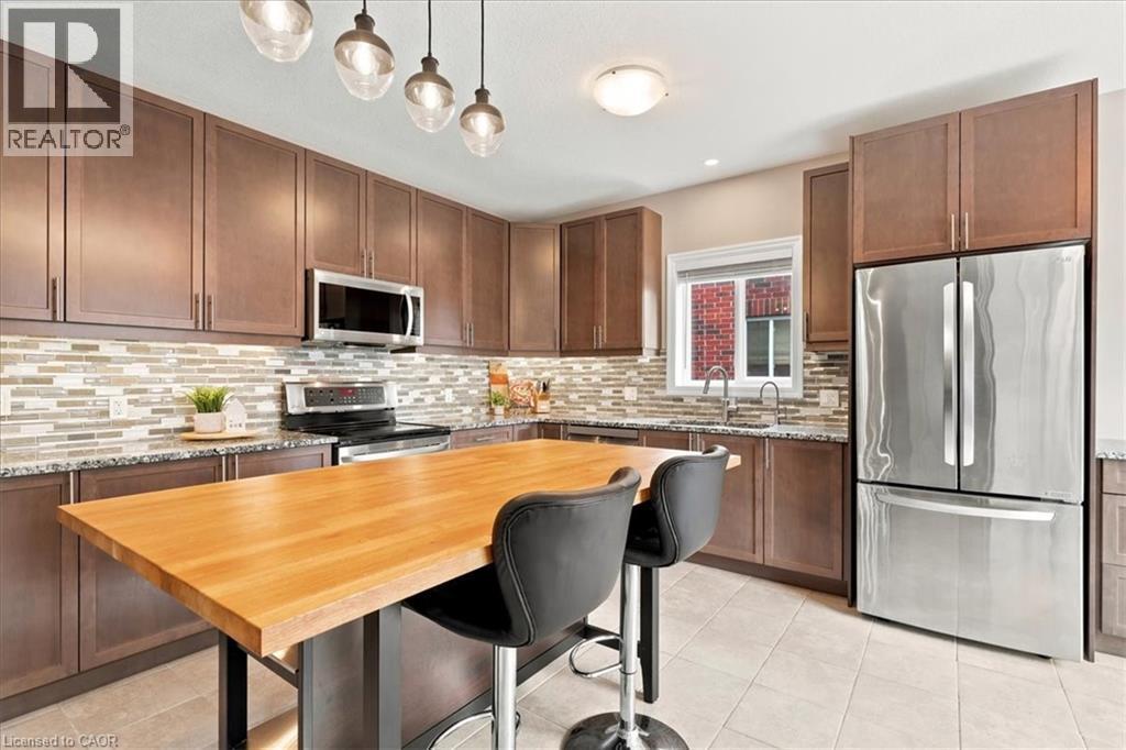 921 Eden Oak Court, Kitchener, ON - Indoor Photo Showing Kitchen With Double Sink