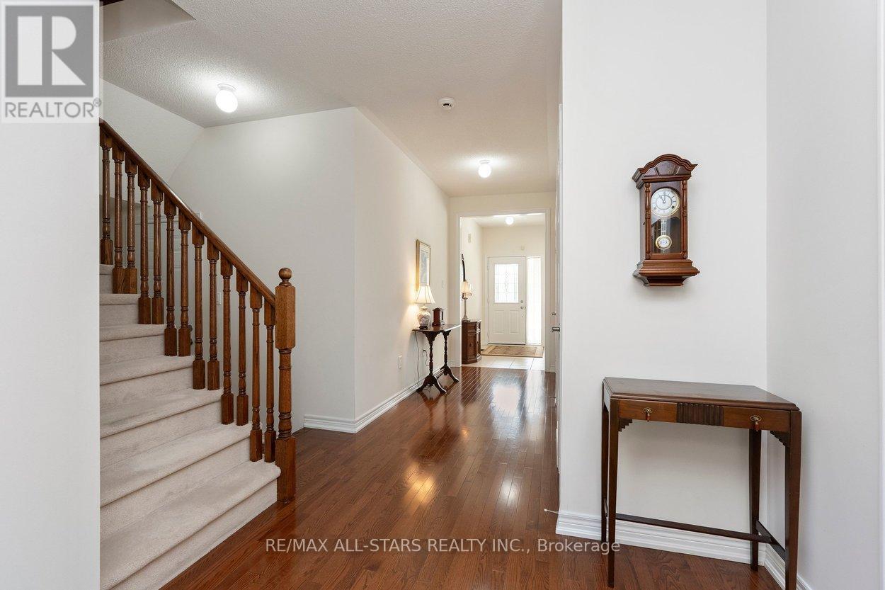 stairs to upper level w 2nd br & family rm - 52 Oasis Way, Markham, ON