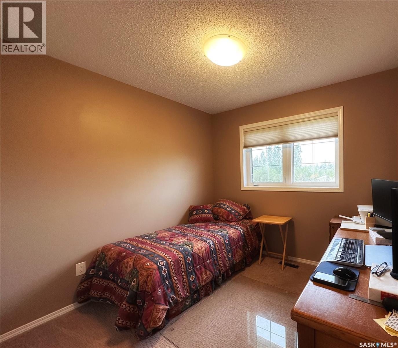 Bassingthwaite Acreage, Asquith, SK - Indoor Photo Showing Bedroom