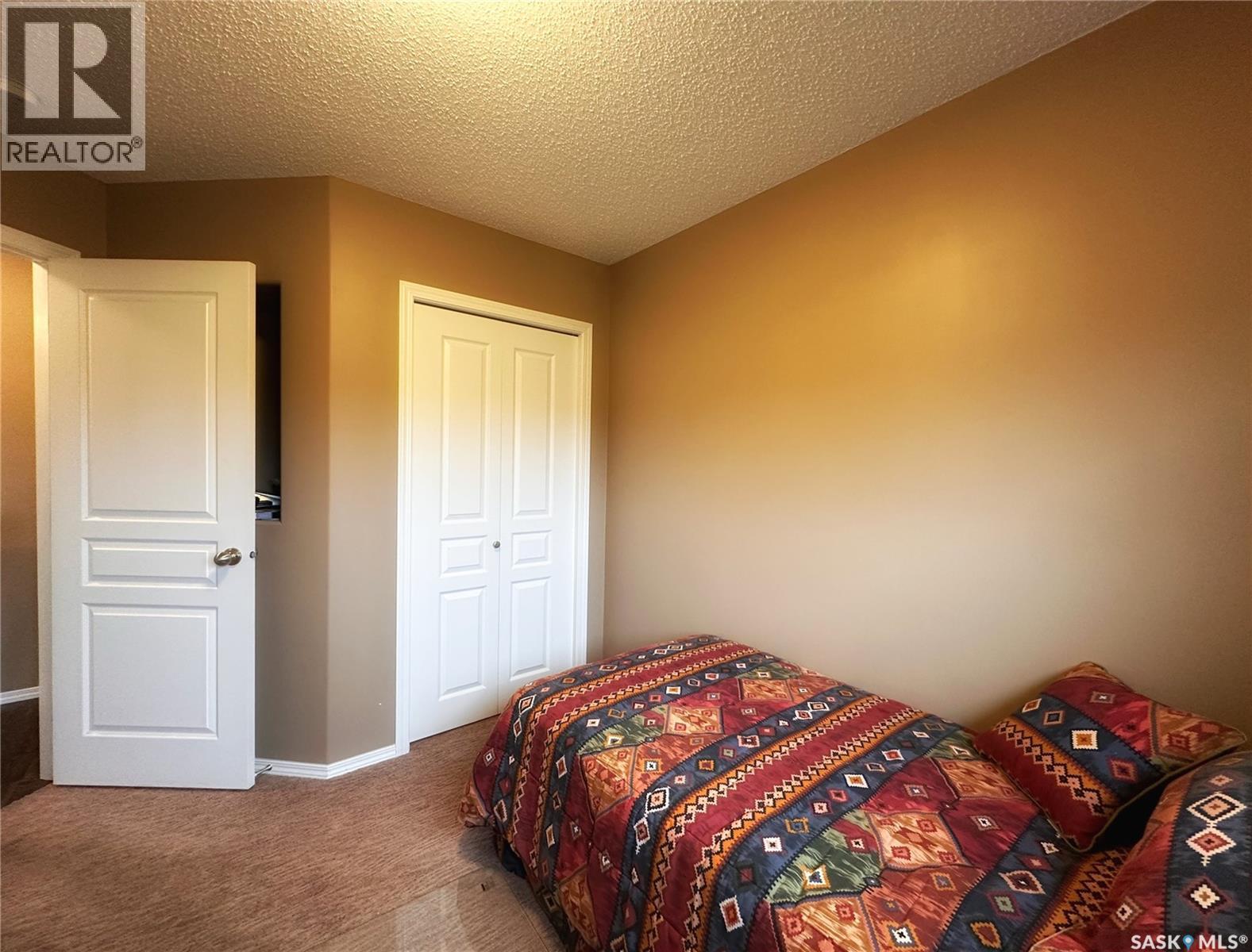 Bassingthwaite Acreage, Asquith, SK - Indoor Photo Showing Bedroom
