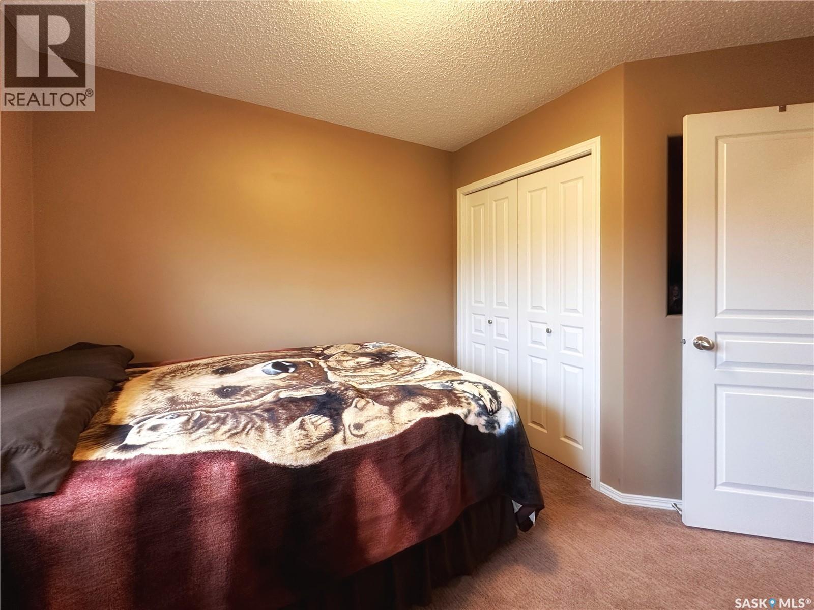 Bassingthwaite Acreage, Asquith, SK - Indoor Photo Showing Bedroom