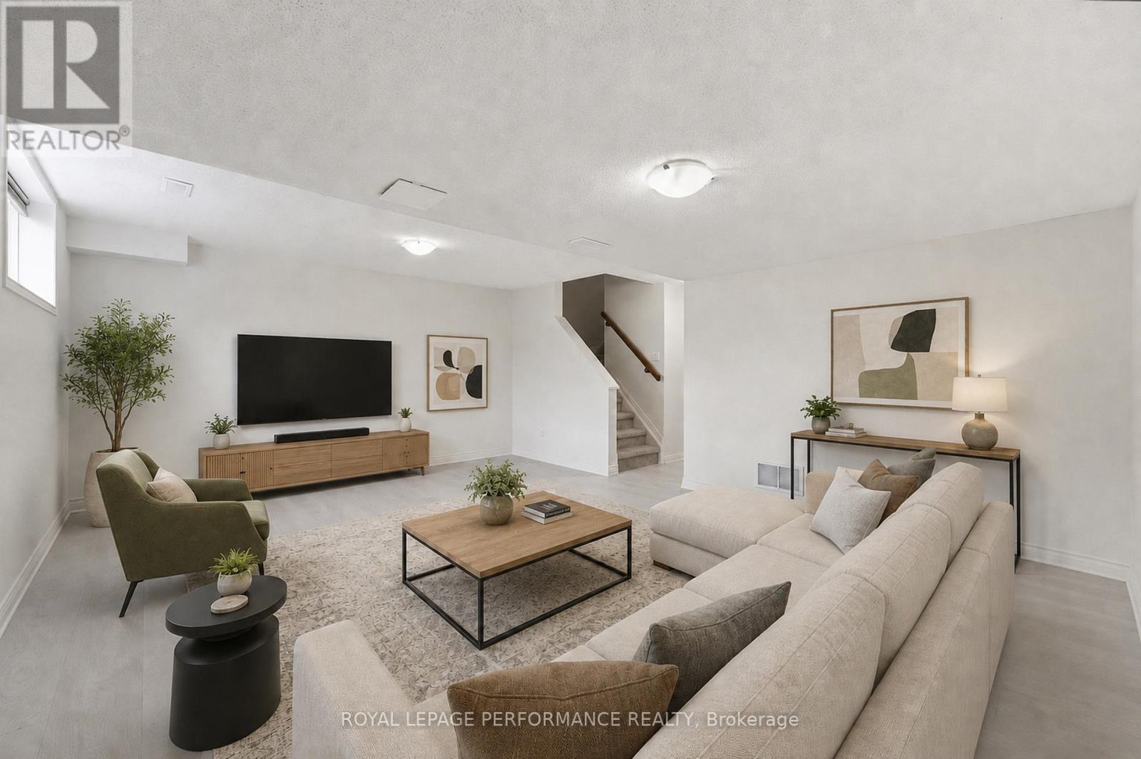 Virtually staged recreation room - 277 Rolling Meadow Crescent, Ottawa, ON