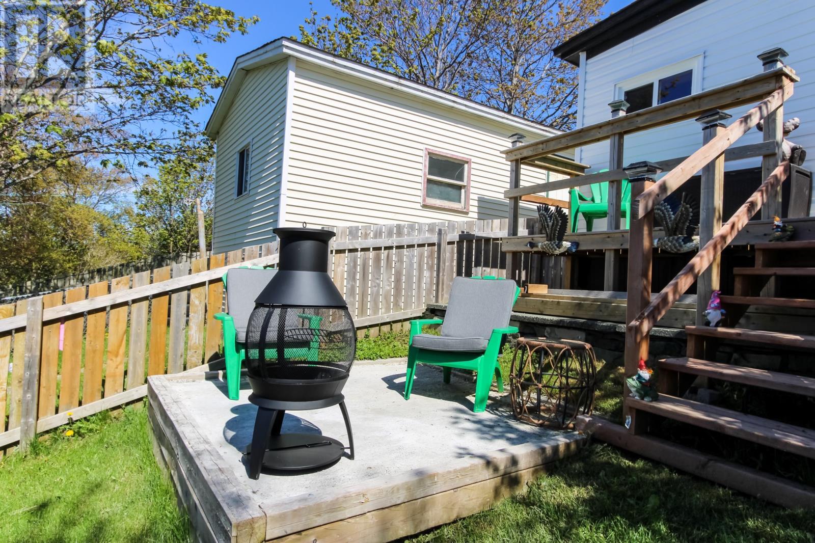 Fire pit area, with additional small patio off the back shed. - 92 Watson Crescent, St. John'S, NL