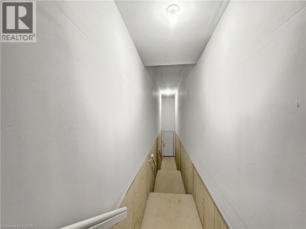 HALLWAY TO BACKYARD ACCESS DOOR - 82 Gledhill Crescent, Cambridge, ON - Indoor Photo Showing Other Room