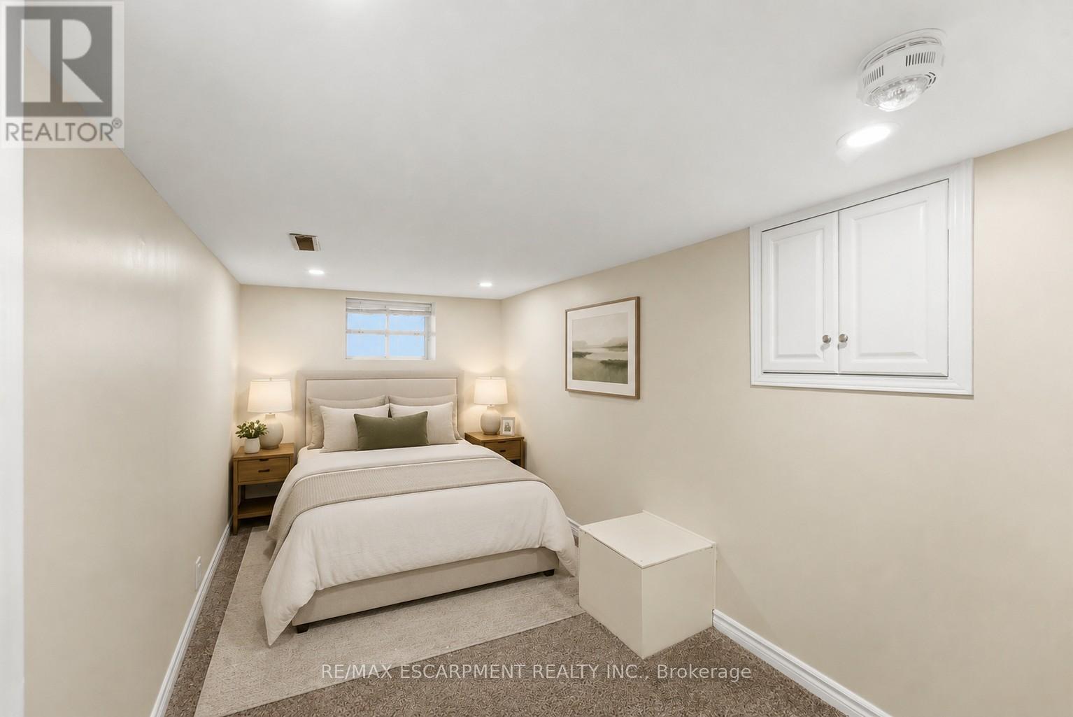 Virtually Staged - Basement Bedroom - 309 Cope Street, Hamilton, ON - Indoor Photo Showing Bedroom