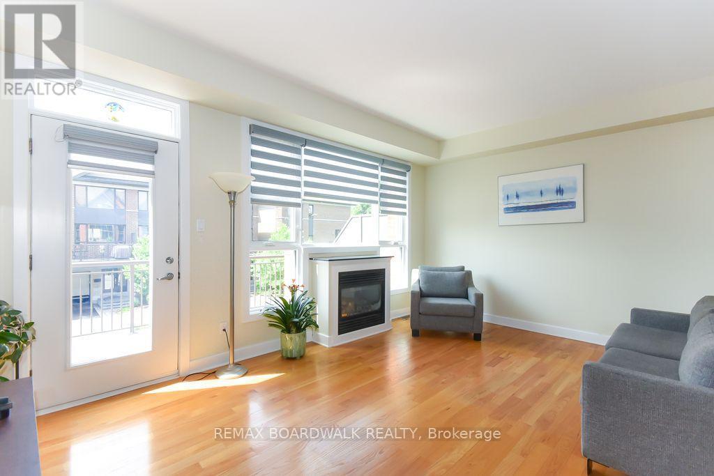 51 Drouin Avenue, Ottawa, ON - Indoor Photo Showing Living Room With Fireplace
