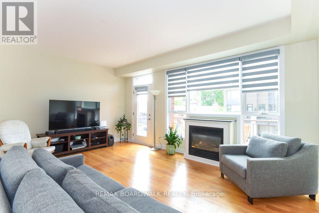 51 Drouin Avenue, Ottawa, ON - Indoor Photo Showing Living Room With Fireplace