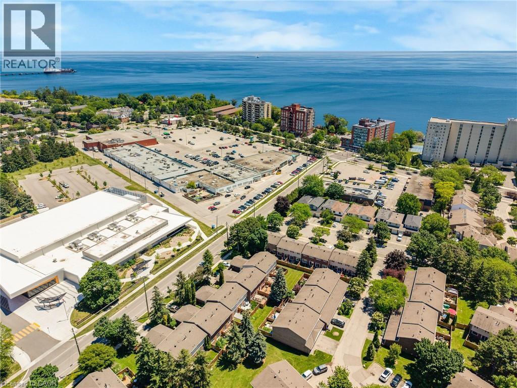 Aerial perspective featuring a body of water, residential properties, and commercial buildings - 5275 Banting Court, Burlington, ON