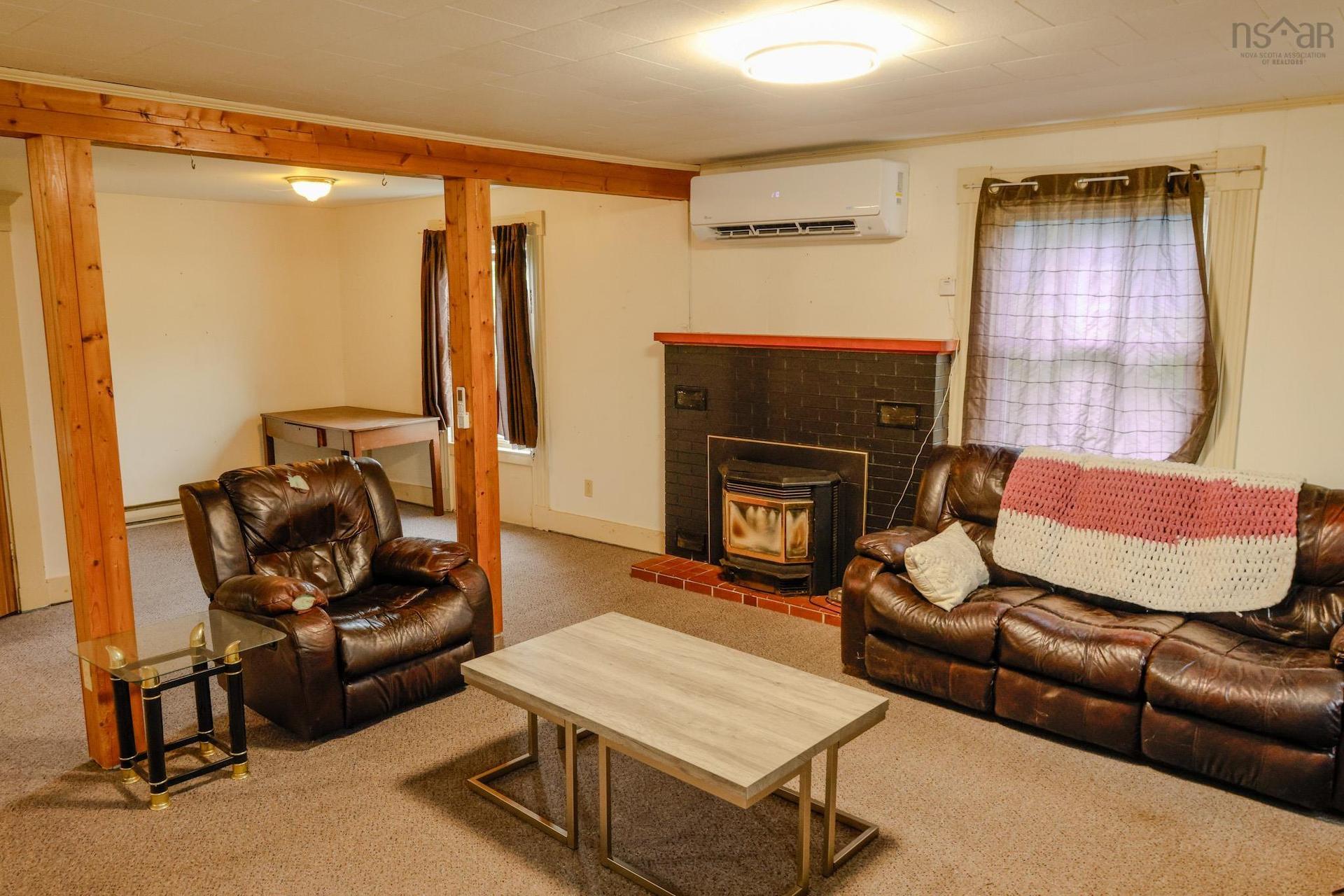 2471 Highway 3, Barrington West, NS - Indoor Photo Showing Living Room With Fireplace