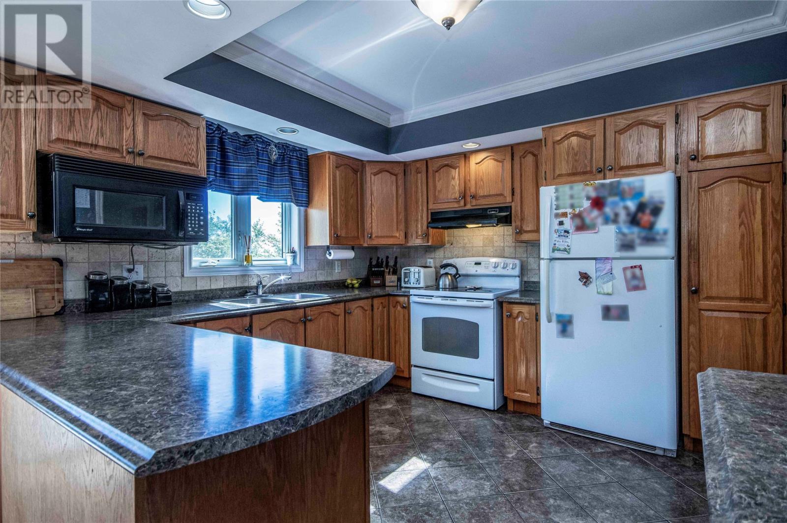 13 Pennells Road, Conception Bay South, NL - Indoor Photo Showing Kitchen With Double Sink