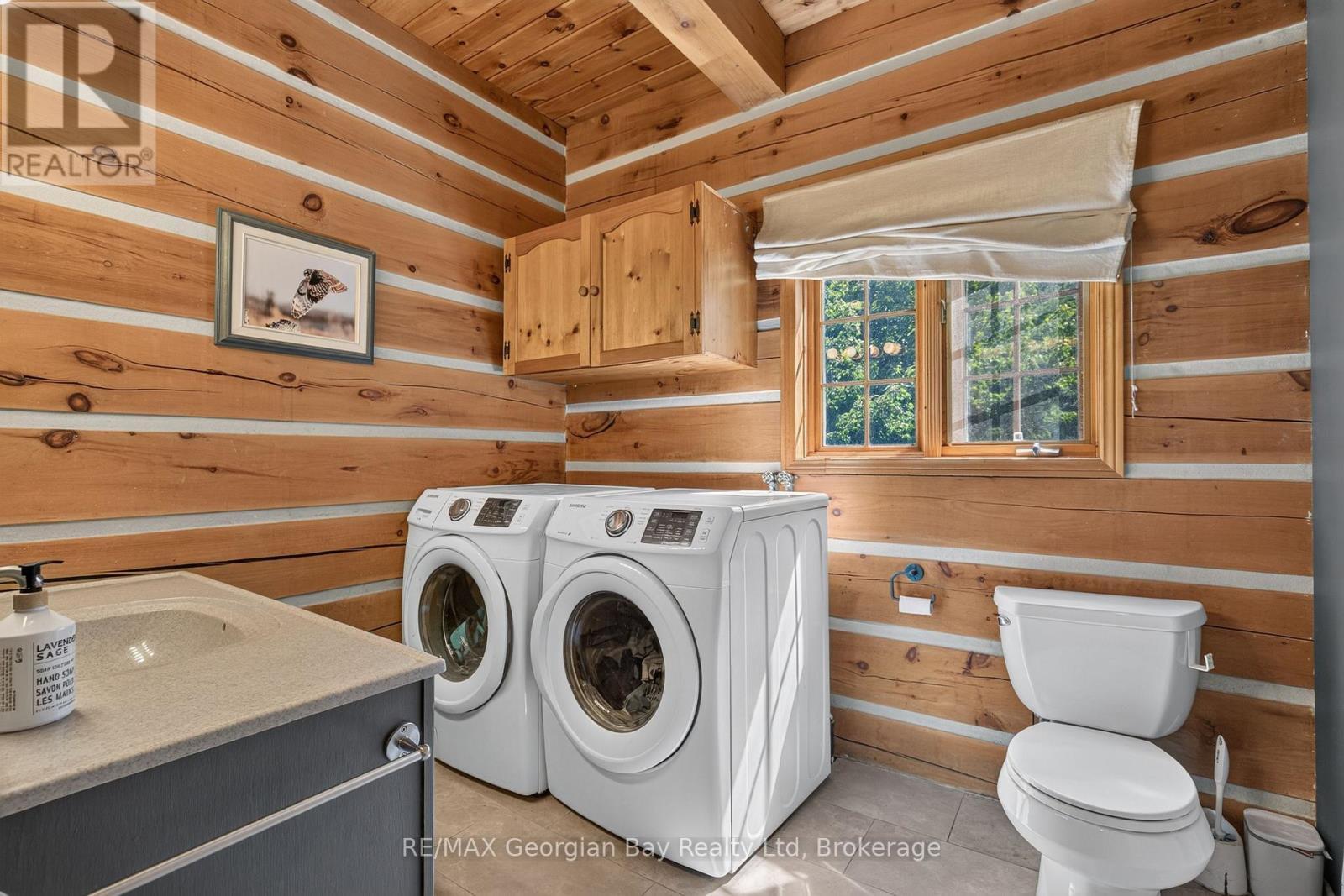 19 Kingfisher Crescent, Tiny, ON - Indoor Photo Showing Laundry Room