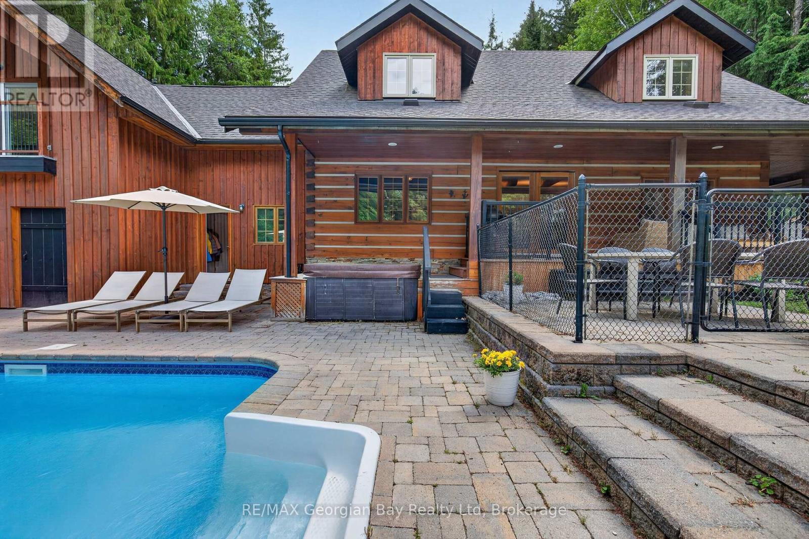 19 Kingfisher Crescent, Tiny, ON - Outdoor With In Ground Pool With Deck Patio Veranda With Exterior