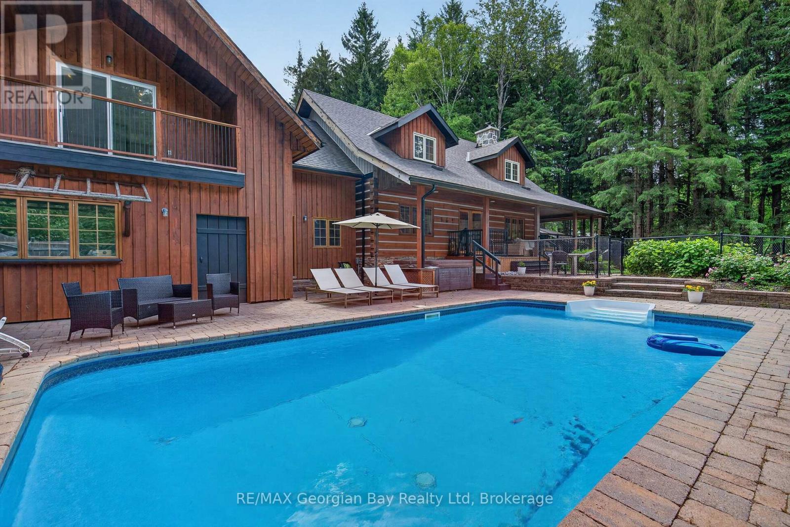 19 Kingfisher Crescent, Tiny, ON - Outdoor With In Ground Pool