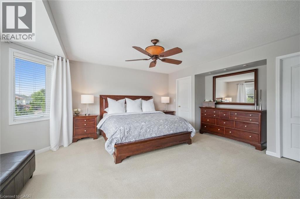 Primary Bedroom Suite with his and hers closets, electric fireplace, sitting area and 5-piece bathroom - 79 Zieman Crescent, Cambridge, ON