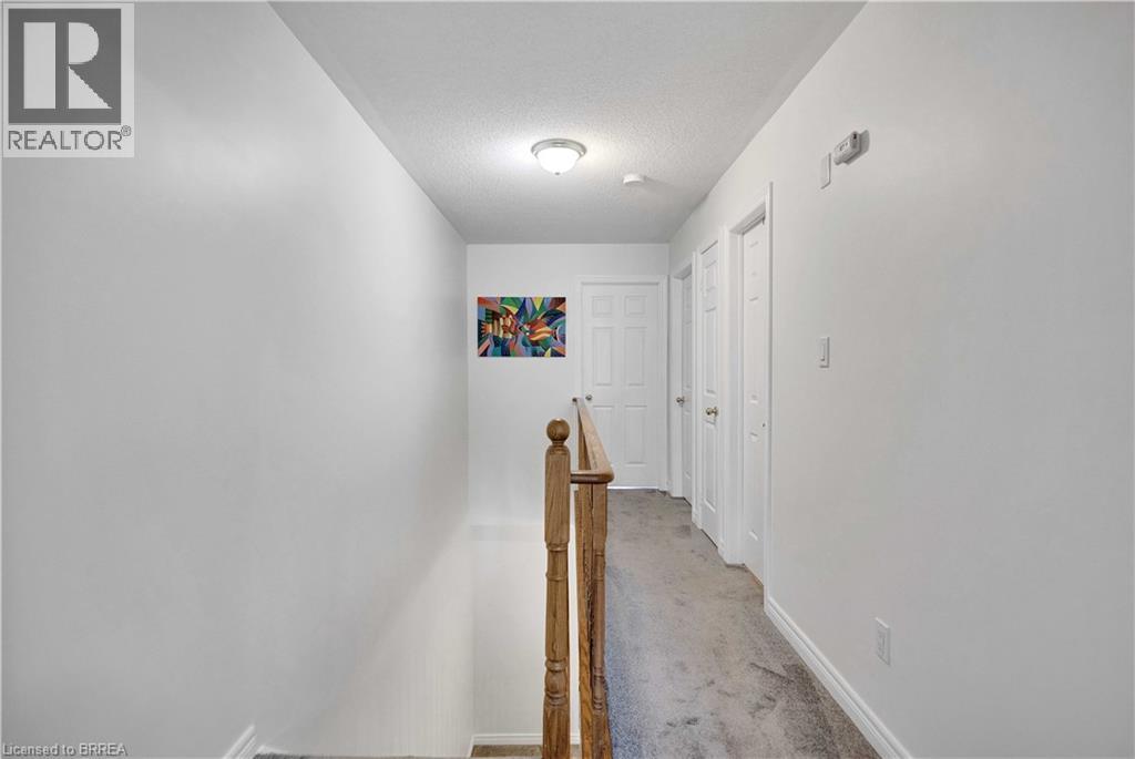 Carpeted hallway - 120 Beddoe Drive Unit# 6, Hamilton, ON