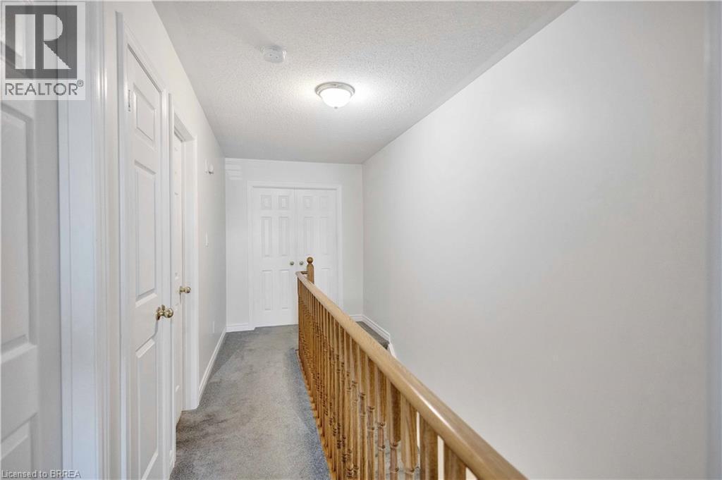 Upper-level hallway - 120 Beddoe Drive Unit# 6, Hamilton, ON