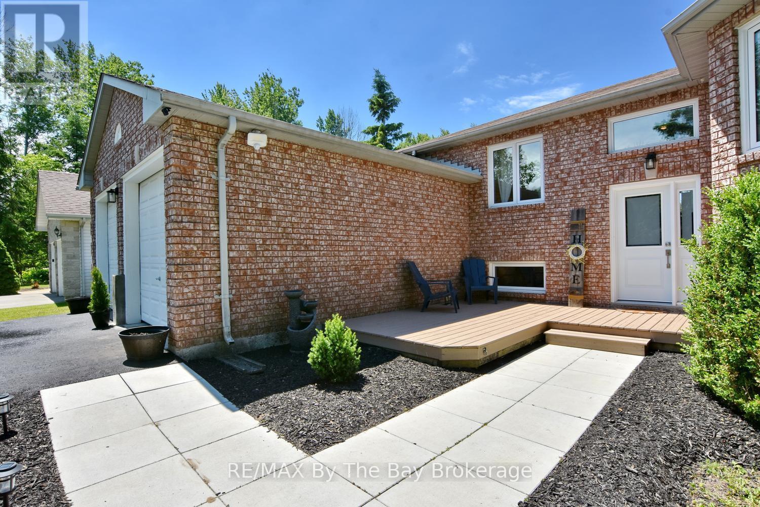 Newly Landscaped Front Yard and Paved Drive - 2 Birchmount Circle, Wasaga Beach, ON