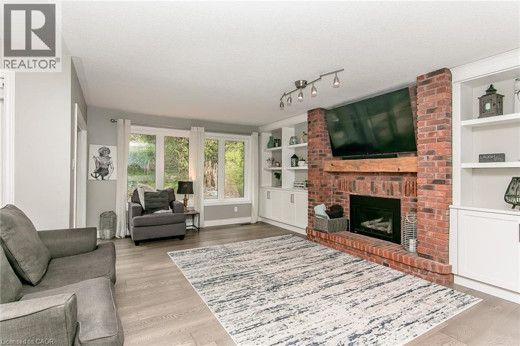 1774 Old Mill Road, Kitchener, ON - Indoor Photo Showing Living Room With Fireplace