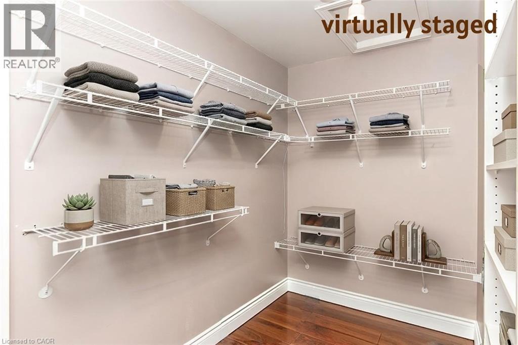 Walk-in closet with access to large storage room or den - 1774 Old Mill Road, Kitchener, ON - Indoor With Storage