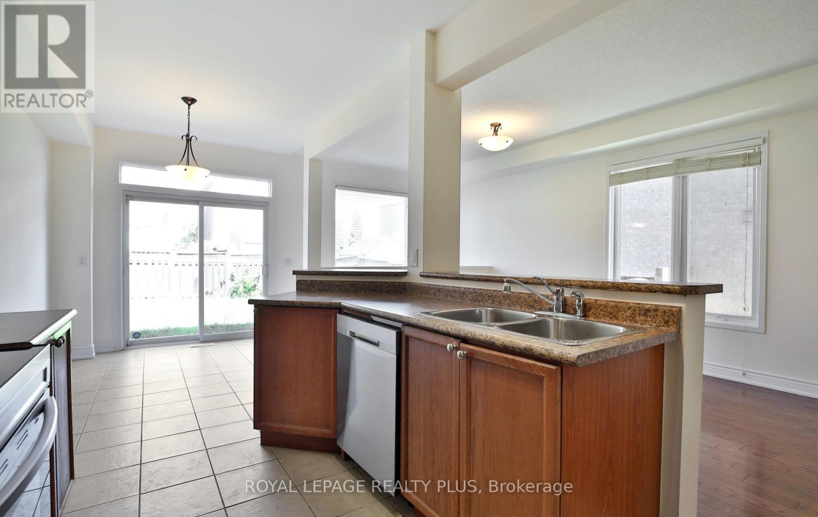 3877 Stardust Drive, Mississauga, ON - Indoor Photo Showing Kitchen With Double Sink