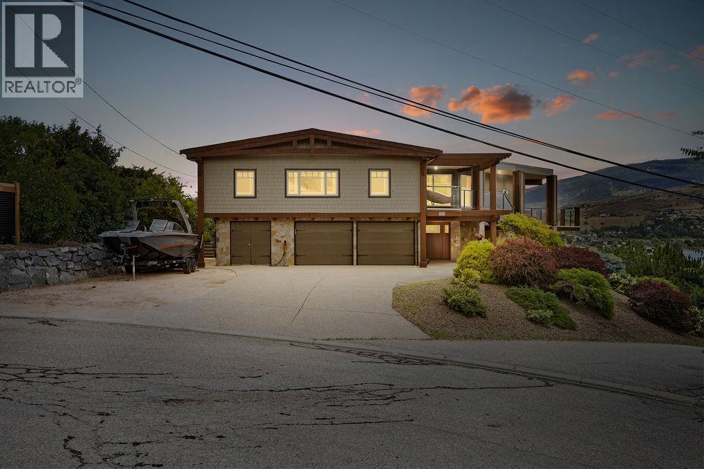 Driveway, double garage, storage room - 13707 Watson Drive, Coldstream, BC