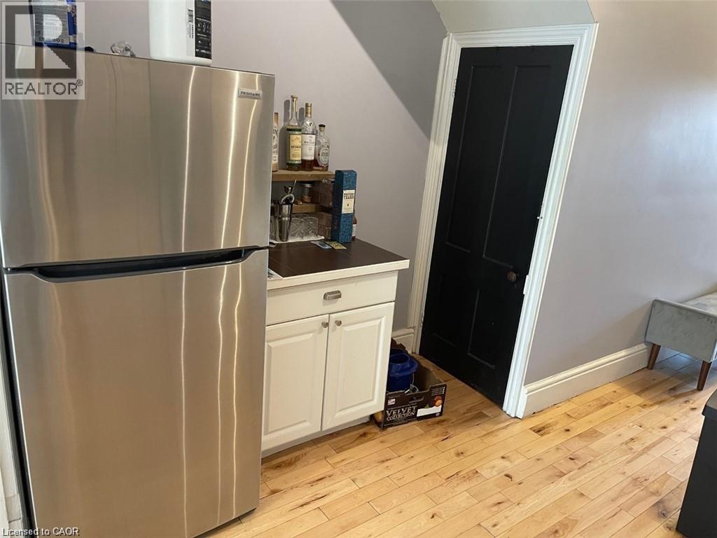 Stainless steel fridge with coffee bar - 195 King Street E Unit# 1, Hamilton, ON - Indoor