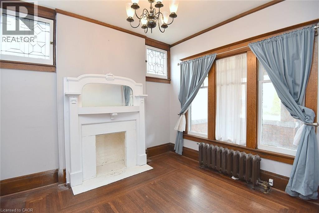 103 Sherman Avenue S, Hamilton, ON - Indoor Photo Showing Other Room With Fireplace