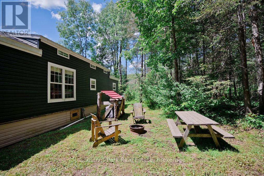 Private Backyard with Generator Shed - Unit 1 - 98 North Shore Road, Kearney (Proudfoot), ON