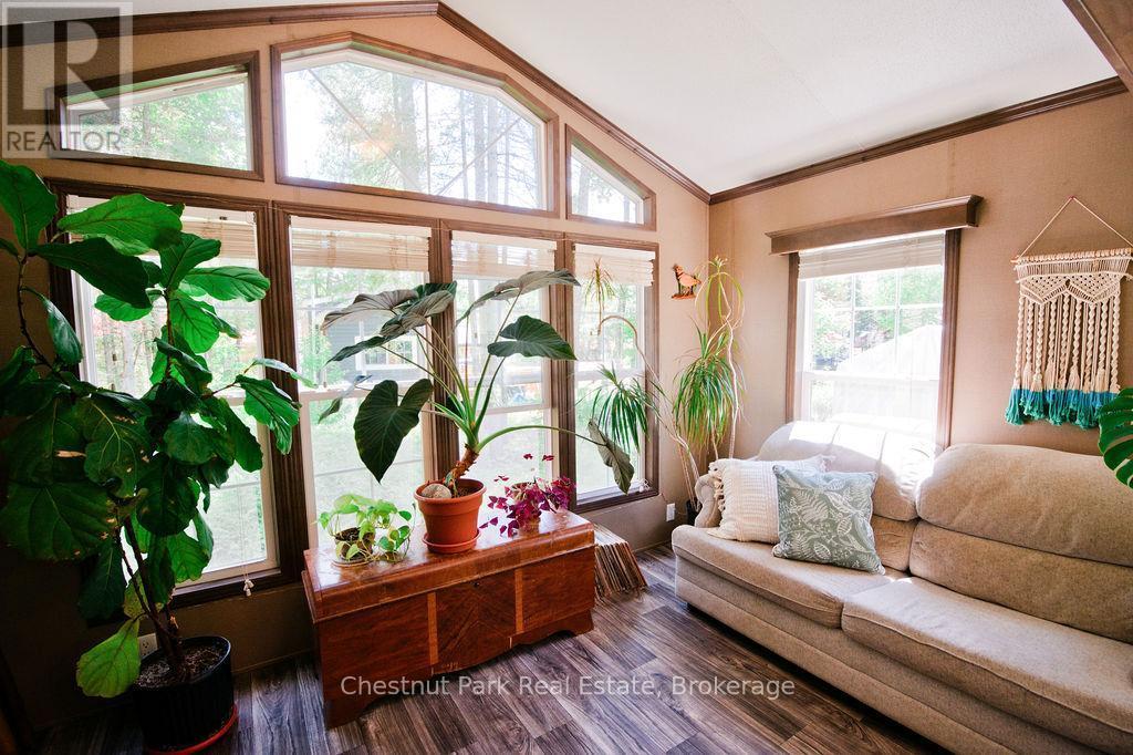 Bifold Door separates Den and Living Room - Unit 1 - 98 North Shore Road, Kearney (Proudfoot), ON