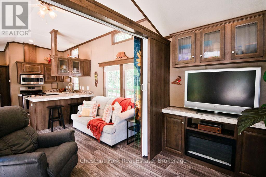 Den can double as a bedroom with a sofa bed - Unit 1 - 98 North Shore Road, Kearney (Proudfoot), ON