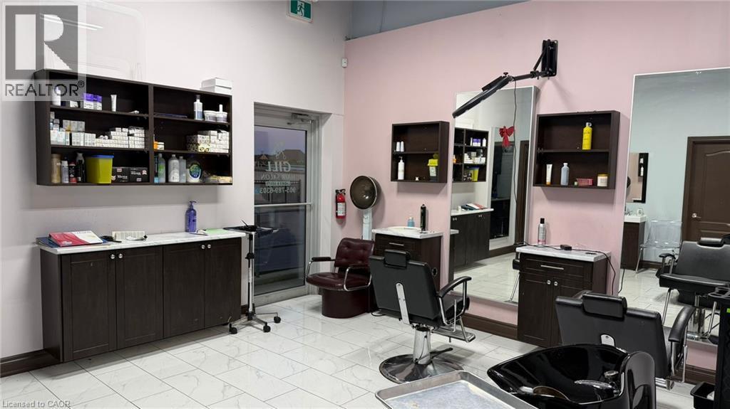 Commercial space featuring multiple stations with large wall-mounted mirrors and integrated shelving - 9 Beaumaris Drive Unit# B4, Brampton, ON