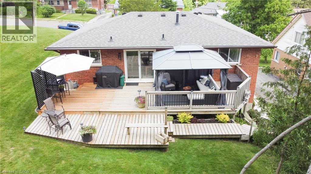 Plenty of outdoor Deck space with hot tub wiring roughed in and a concrete pad underneath - 294 South Drive, Simcoe, ON
