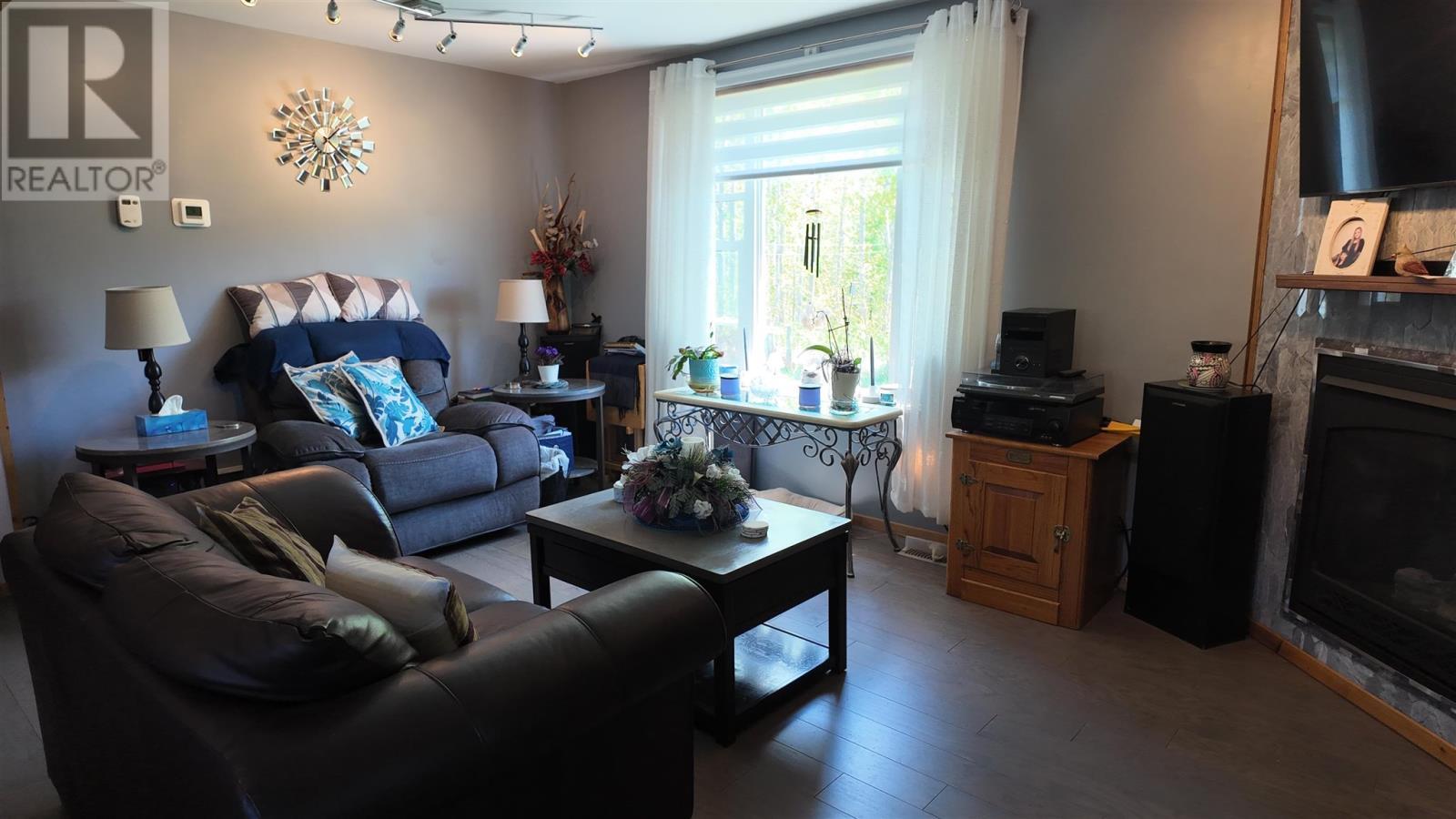 1607 Hilton Rd, Jocelyn Township, ON - Indoor Photo Showing Living Room With Fireplace