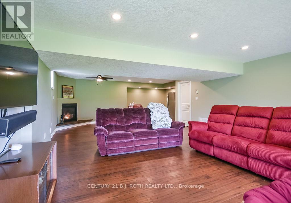 Spacious rec room with gas fireplace - 5051 Sideroad 25, Ramara, ON