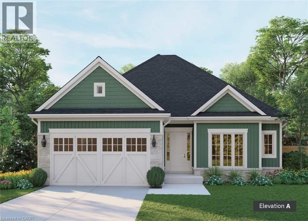 Craftsman-style exterior featuring deep green siding, white trim accents, and a dark shingle roof - 16 Workman Crescent, Plattsville, ON