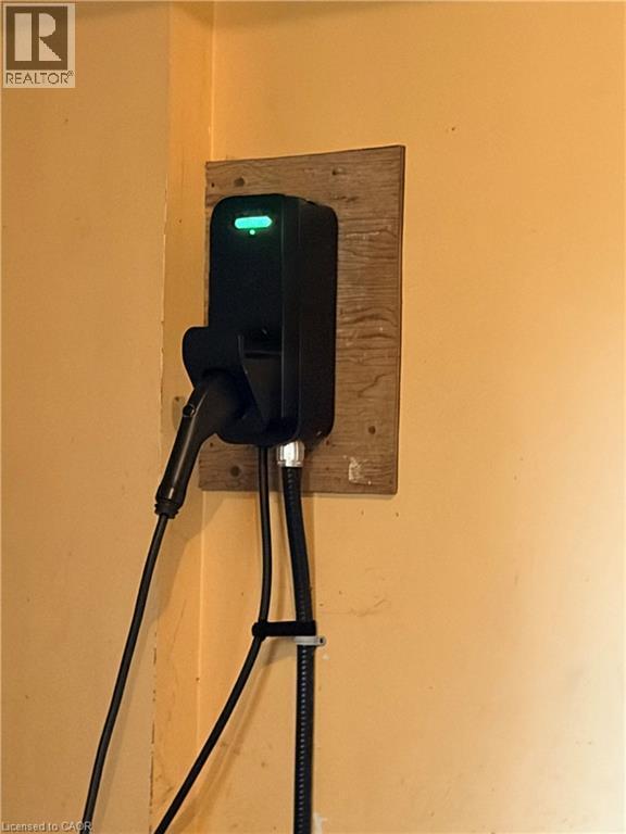 Hardwired electric car charger in garage - 50 Thorncliffe Road, Simcoe, ON