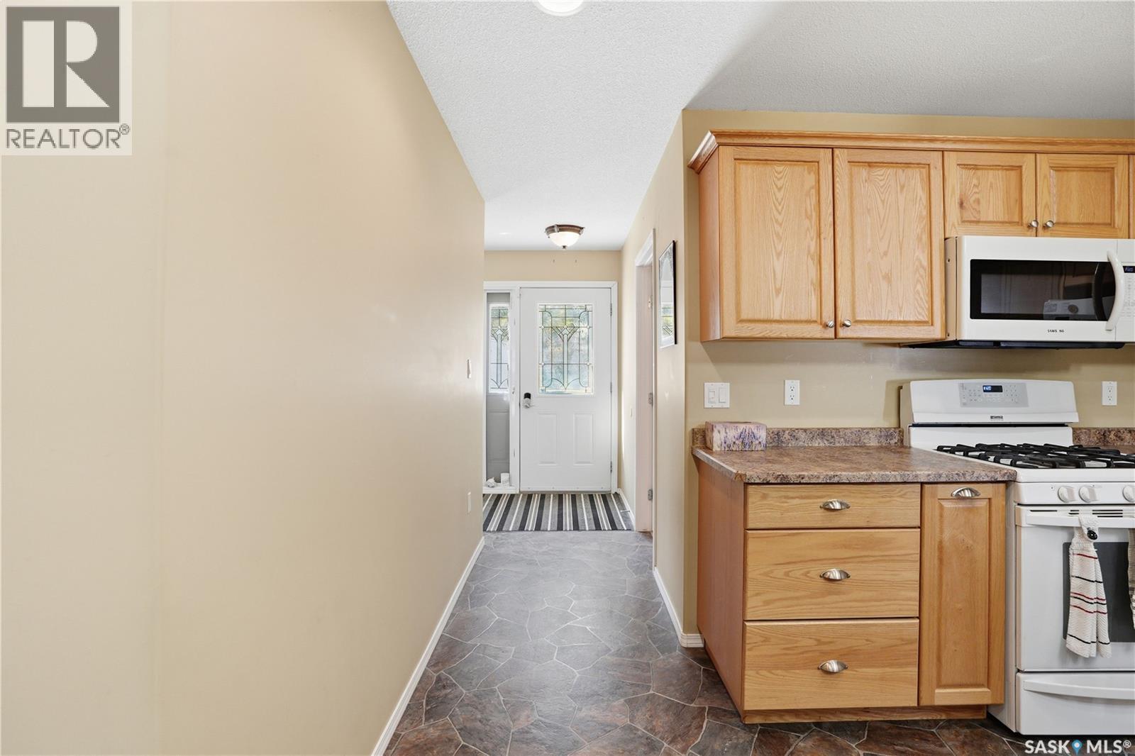 205 Bay Drive W, Christopher Lake, SK - Indoor Photo Showing Kitchen