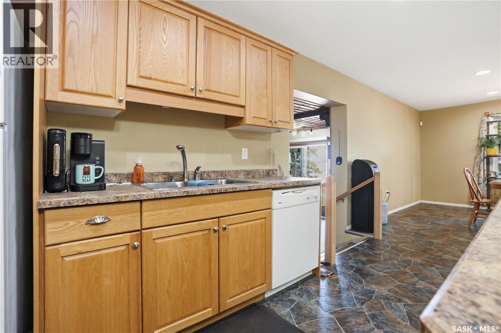 205 Bay Drive W, Christopher Lake, SK - Indoor Photo Showing Kitchen With Double Sink