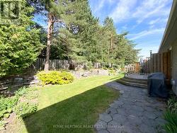 SURROUNDED BY MATURE TREES -