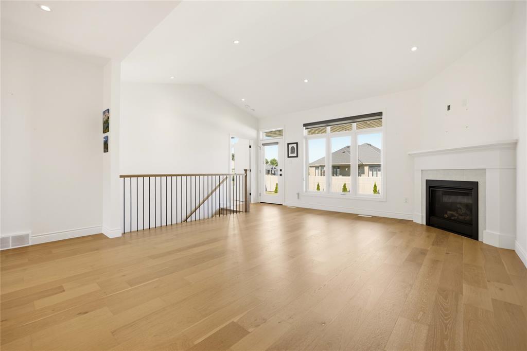 102 Leneve Street, Lambton Shores, ON - Indoor Photo Showing Living Room With Fireplace