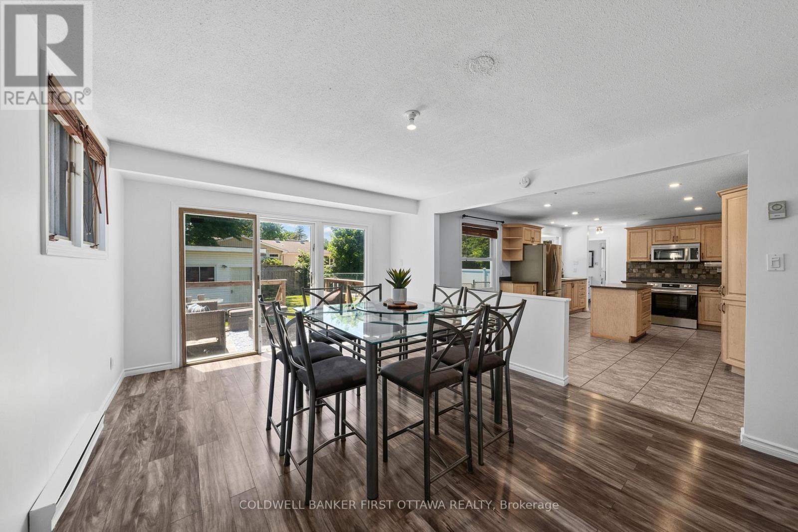 Dining area w access to mud room & backyard! - 12 Bradgate Drive, Ottawa, ON