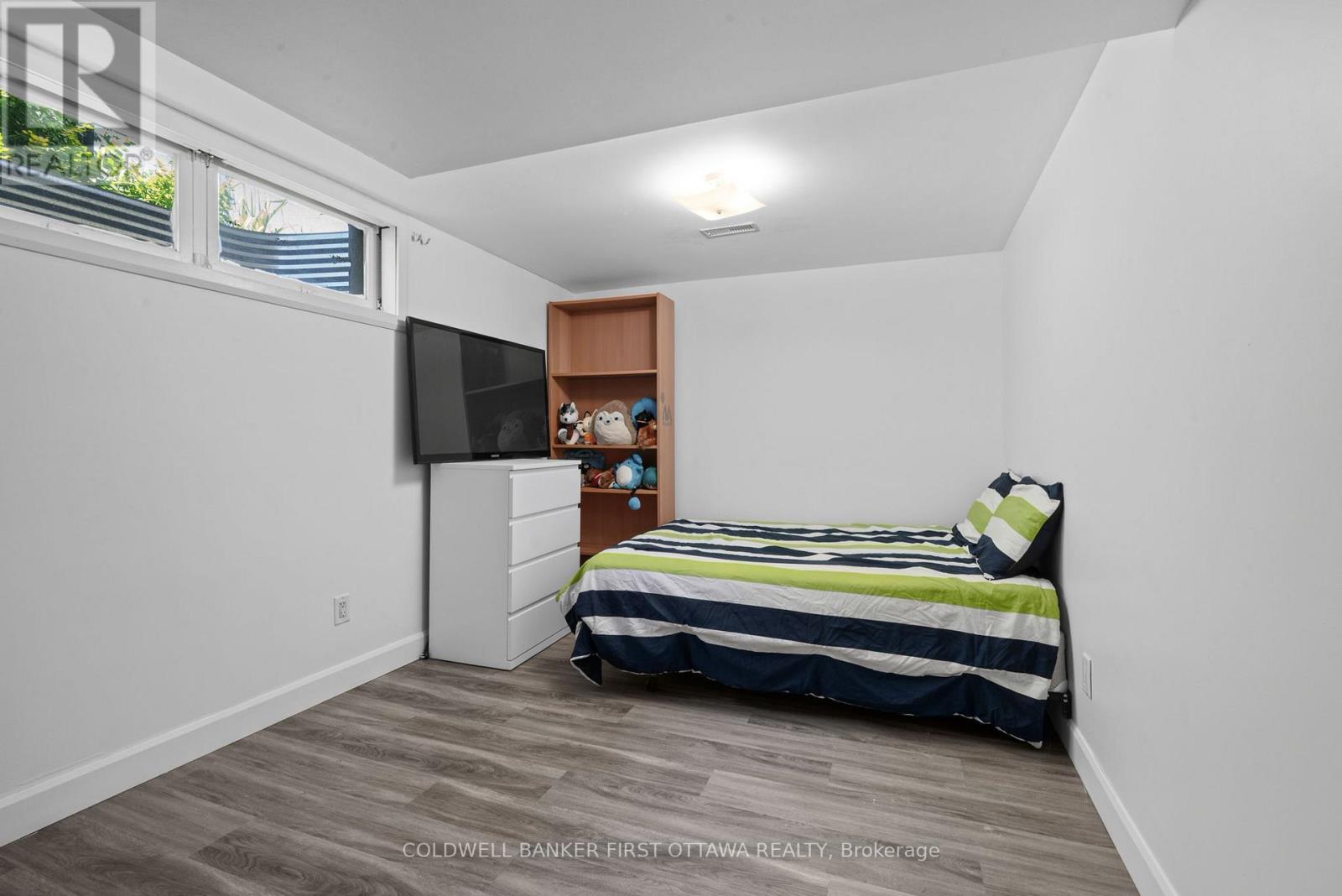 Basement bedroom w bright window! - 12 Bradgate Drive, Ottawa, ON