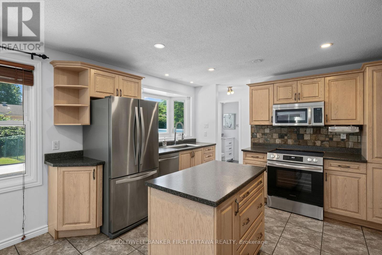 Prepping island & all stainless steel appliances - 12 Bradgate Drive, Ottawa, ON