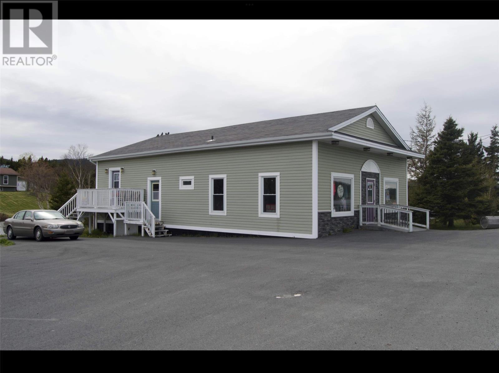 Upper door to apartment/lower door to retail space - 27-29 Conception Bay Highway, Clarkes Beach, NL