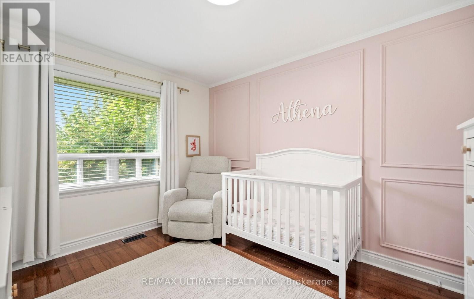Bedroom 2 with large window overlooking backyard - 5 Mendip Crescent, Toronto, ON