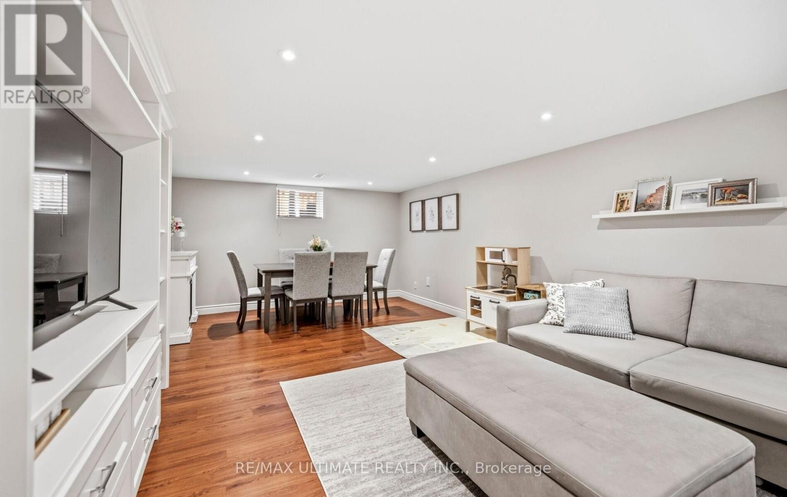 Basement living room overlooks dining area - 5 Mendip Crescent, Toronto, ON