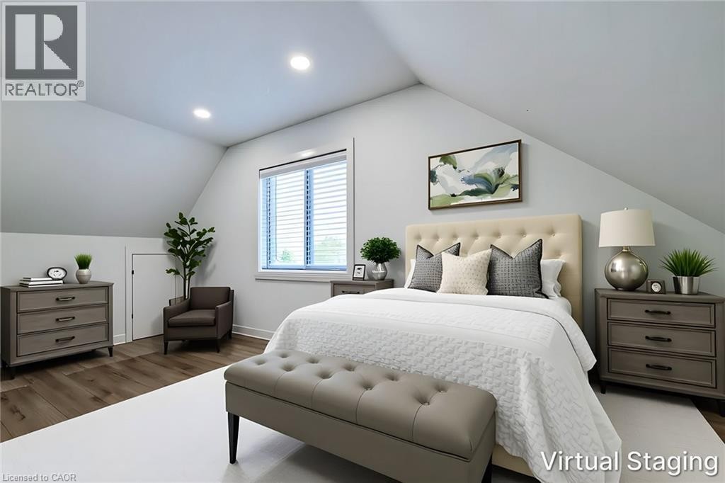 Sloped ceiling bedroom featuring recessed lighting and wood-finish flooring - 78 Hillyard Street, Hamilton, ON